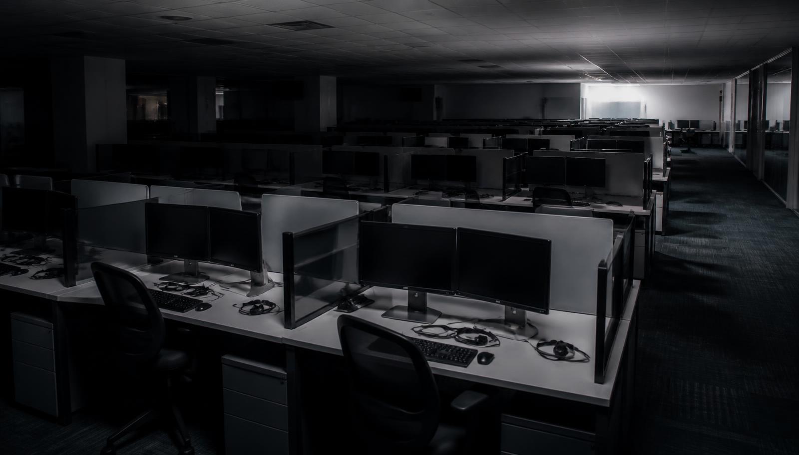 An empty contact centre at night, illustrating automated decision making disclosure rules