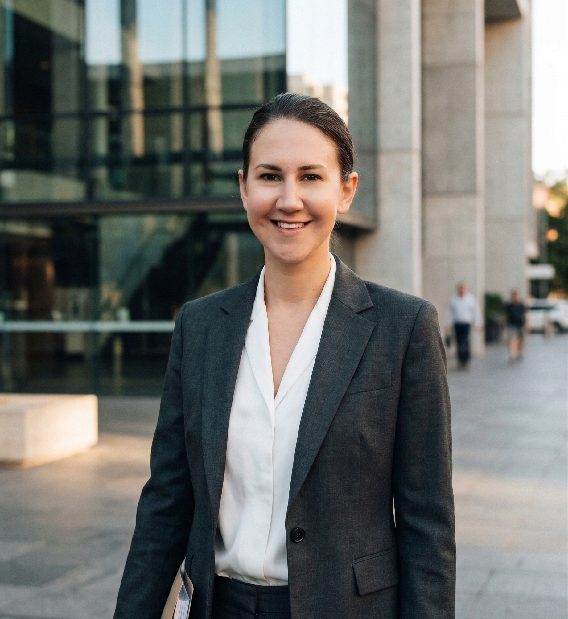 A lawyer outside the Queensland Supreme Court, weighing when to initiate commercial litigation